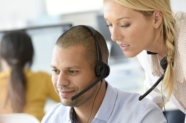Two workers. Learn about the roles of workers' compensation claims, medical, rehab and legal professionals feature image