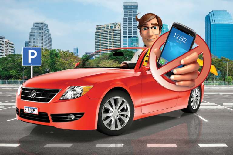 A cartoon of Skip, an SFM mascot, in a car with a "no cell phone" image. Read about driving safety.