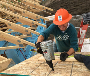 SFM employees volunteer at a Habitat for Humanity build