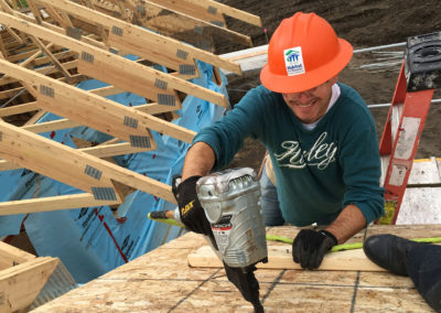 SFM employees volunteer at a Habitat for Humanity build